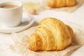 Delicious morning coffee cup with croissant close up on white Royalty Free Stock Photo