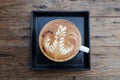 A cup of coffee mocha on wooden Royalty Free Stock Photo