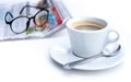 Cup of coffee in morning with newspaper and glasses Royalty Free Stock Photo