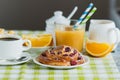 Cup of coffee, muesli, baking and orange juice Royalty Free Stock Photo