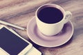 Cup of coffee, notepad, pen and a smartphone Royalty Free Stock Photo