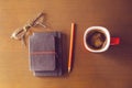 Cup of coffee, notepads with glasses and pen Royalty Free Stock Photo