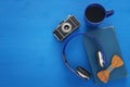 cup of coffee, old book, vintage photo camera and headphones Royalty Free Stock Photo