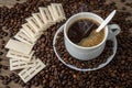 Cup of Coffee Over Coffee Beans Royalty Free Stock Photo