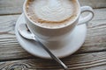 Cup of coffee over wooden table