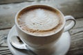 Cup of coffee over wooden table