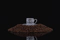 A cup of coffee on a pile of coffee beans Royalty Free Stock Photo