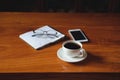 A cup of coffee placed on the desk during relax time Royalty Free Stock Photo