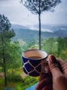 A cup of coffee on a rainy day in the mountain velly