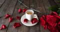 Cup of coffee with red roses Royalty Free Stock Photo