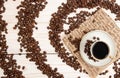 Cup of coffee, roasted coffee beans. Top view Royalty Free Stock Photo