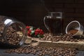 Cup of coffee on a rustic wood. Glass jar with coffee beans Royalty Free Stock Photo