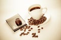 A cup of coffee, seeds, candy and cards Royalty Free Stock Photo