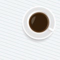 A cup of coffee on the sheet of paper