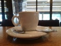 A cup of coffee in the coffee shop, on the table