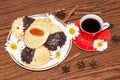 A cup of coffee and shortbread cookies