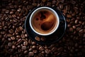 a cup of coffee sits on top of a pile of coffee beans Royalty Free Stock Photo