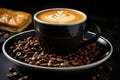 a cup of coffee sits on top of a plate of coffee beans Royalty Free Stock Photo