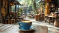 A cup of coffee sits on a wooden table in a cafe. AI generated