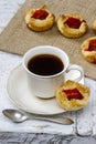 Cup of coffee and small cakes Royalty Free Stock Photo