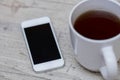 Cup of coffee, smart phone and tablet Royalty Free Stock Photo