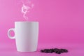 Aromatic Delight: Cup of Coffee with Smoke and Coffee Beans