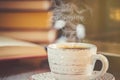 A cup of coffee and a smoke good morning at the office at work. Royalty Free Stock Photo