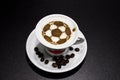 A cup of coffee with soccer ball Royalty Free Stock Photo