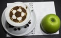 A cup of coffee with soccer ball Royalty Free Stock Photo