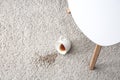 Cup of coffee spilled on carpet Royalty Free Stock Photo