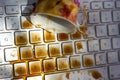 Cup of coffee spilling onto a laptop keyboard Royalty Free Stock Photo