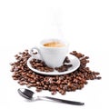 A cup of coffee with spoon and coffee beans isolated on white background Royalty Free Stock Photo