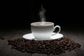 Cup of coffee with steam and coffee beans Royalty Free Stock Photo