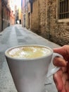 A cup of coffee in the streets of Venice, Italy. Royalty Free Stock Photo