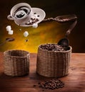 Cup of coffee, a sugar and coffee beans in the air . Royalty Free Stock Photo