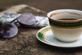 Cup of coffee, sun glasses, and newspaper Royalty Free Stock Photo