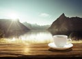 Cup of coffee and sunset in Norway Royalty Free Stock Photo