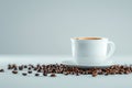 A Cup of Coffee Surrounded by Coffee Beans Royalty Free Stock Photo