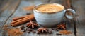 A Cup of Coffee Surrounded by Cinnamons and Star Anise