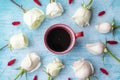 Cup of coffee surrounded by white roses Royalty Free Stock Photo