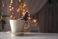 Cup of coffee with a sweet cookie Royalty Free Stock Photo