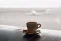 Cup of coffee on the table in airport cafe. Royalty Free Stock Photo