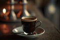 A cup of coffee is on a table. Beautiful mug and saucer.