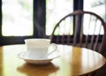 Cup of coffee on table in cafe Royalty Free Stock Photo