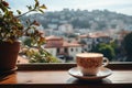 A cup of coffee on a table of outdoor restaurant in small seaside town in Italy. Having breakfast coffee in Italian scenery on Royalty Free Stock Photo