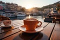 A cup of coffee on a table of outdoor restaurant in small seaside town in Italy. Having breakfast coffee in Italian scenery on Royalty Free Stock Photo