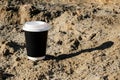 Cup of coffee on a table over blue sky and empty sea beachside. Summer holiday concept. Mock up, copy space Royalty Free Stock Photo