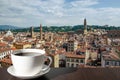 Cup of coffee on the table with view from above of Florence historic city center in Italy Royalty Free Stock Photo