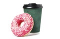 Cup of coffee with tasty donut