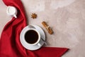 Cup of coffee or tea red napkin milk concrete background